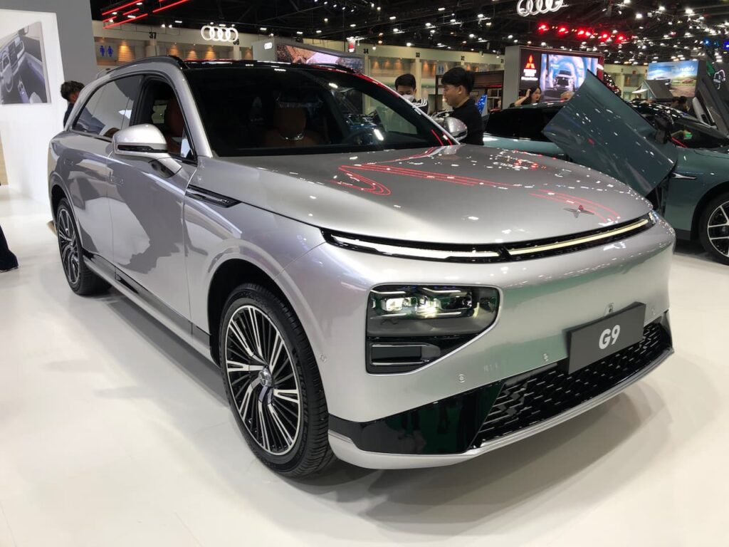 Silver G9 SUV displayed at auto show